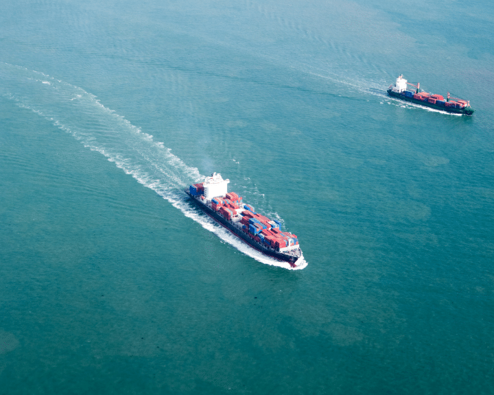 A ship carrying cargo in the ocean in the global supply chain. Learn more about how Chain.io can help with carrier integration